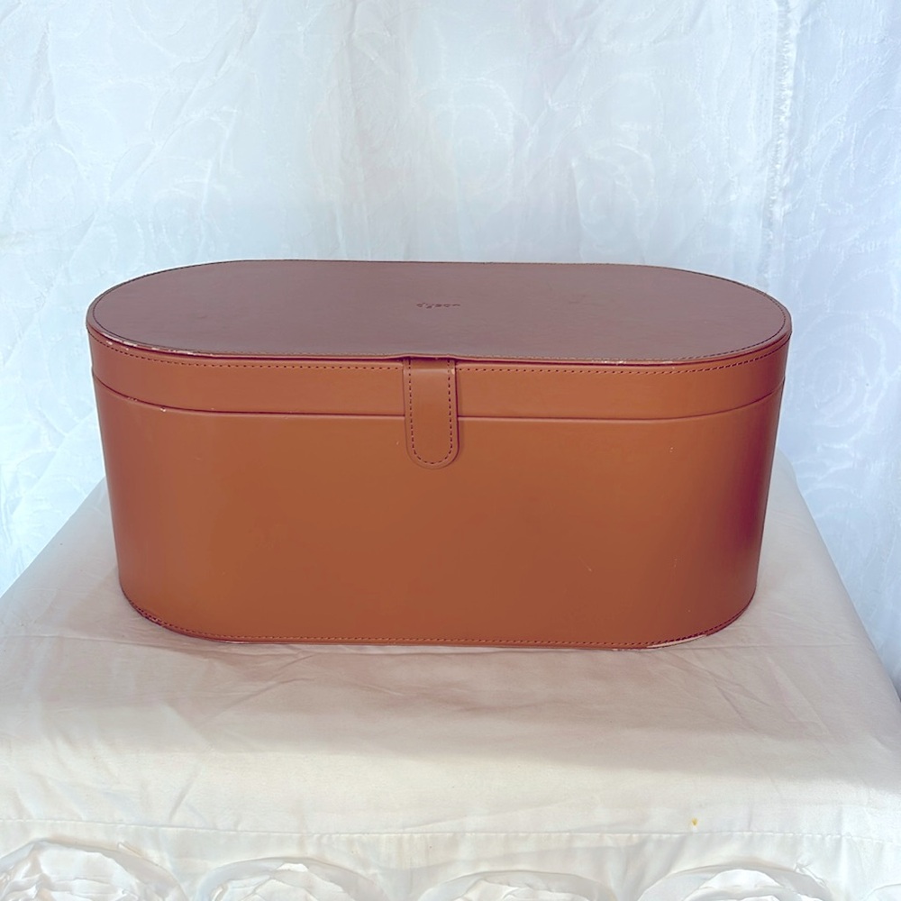DYSON cognac colored storage case for Air wrap.